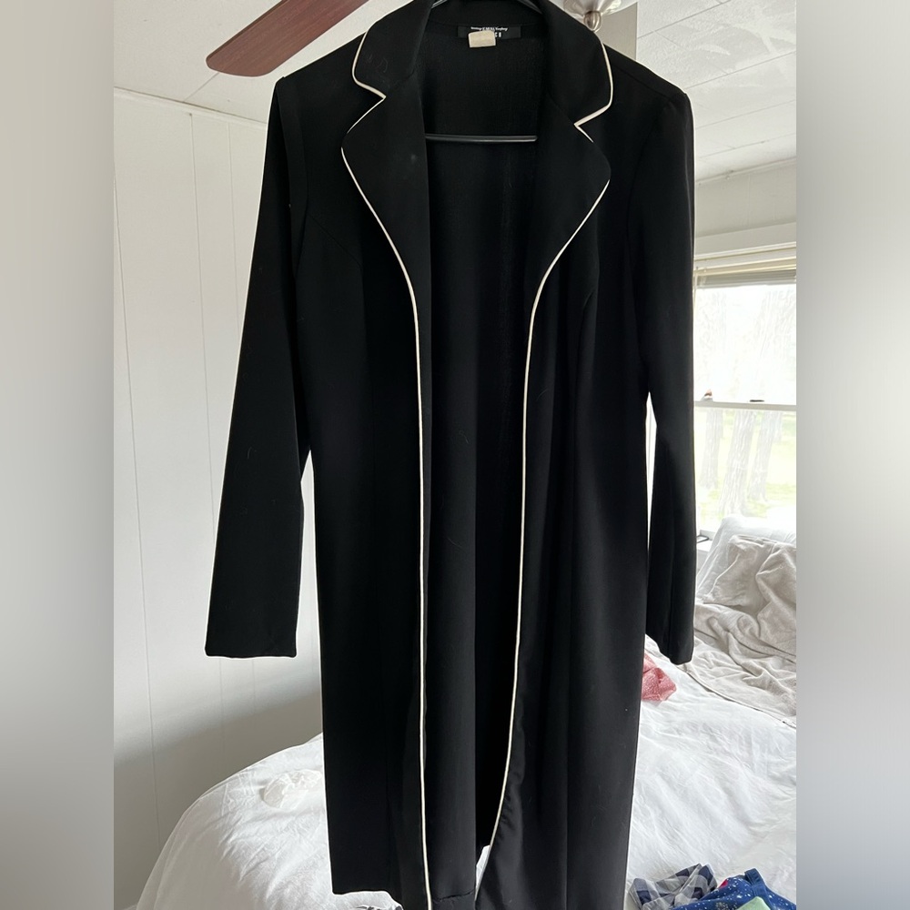 Vintage woman’s small thigh length jacket.